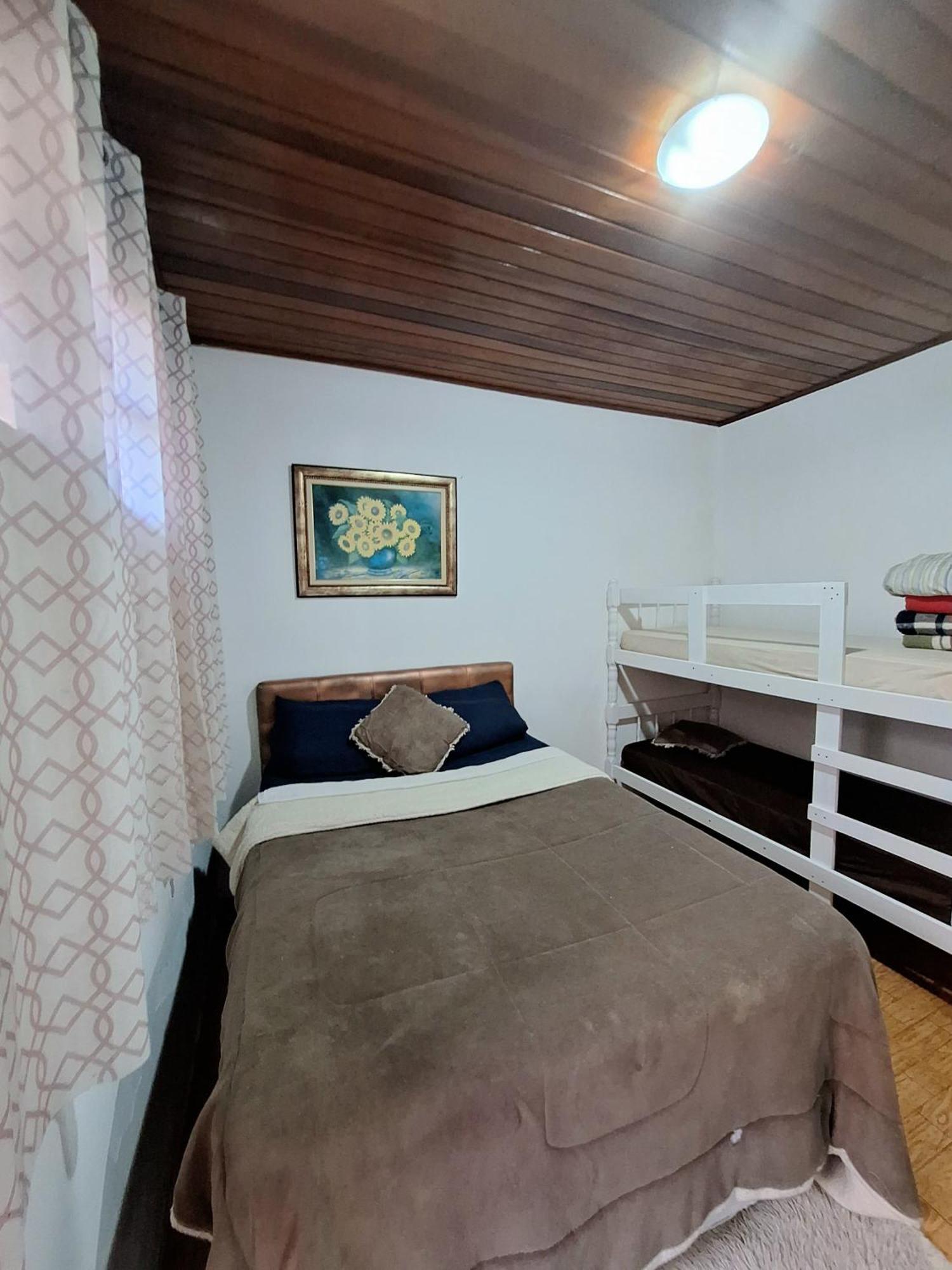 Suite Refúgio da Serra em Campos do Jordão Quarto em Acomodações Particulares