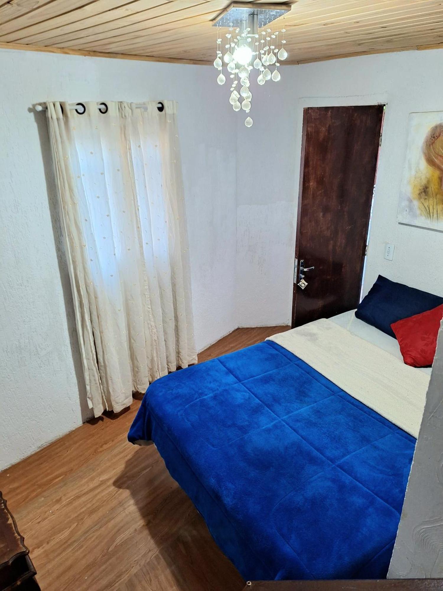 Suite Refúgio da Serra em Campos do Jordão Quarto em Acomodações Particulares *